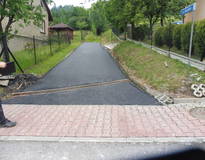 Obraz przedstawiający Remont i wykonanie nawierzchni asfaltobetonowych na terenie Gminy Stryszawa