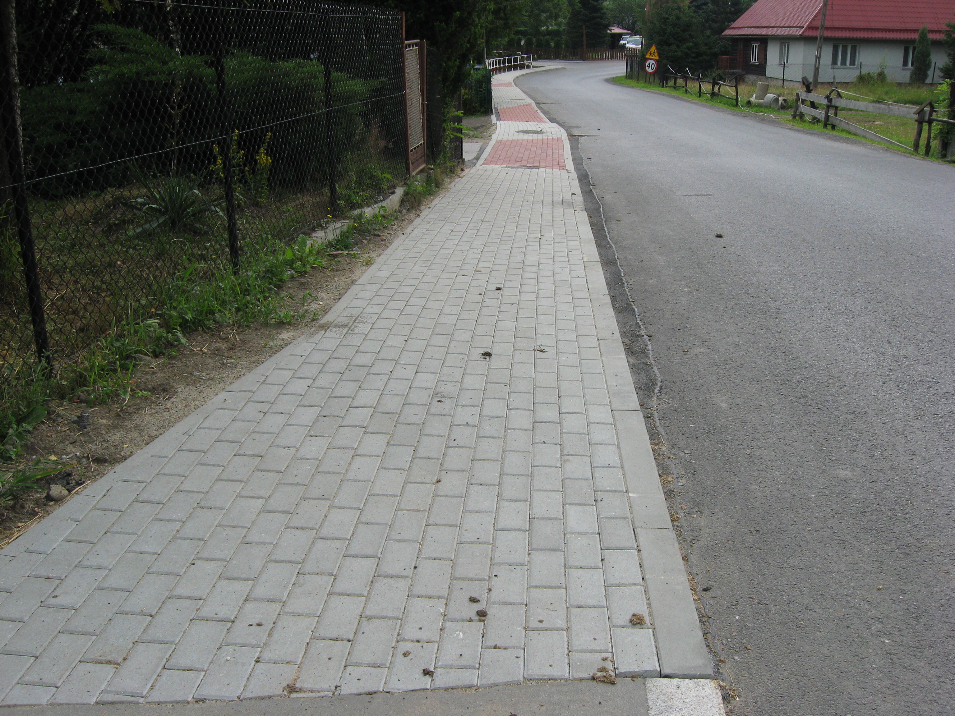 Obraz przedstawiający Budowa chodnika w miejscowości Kurów