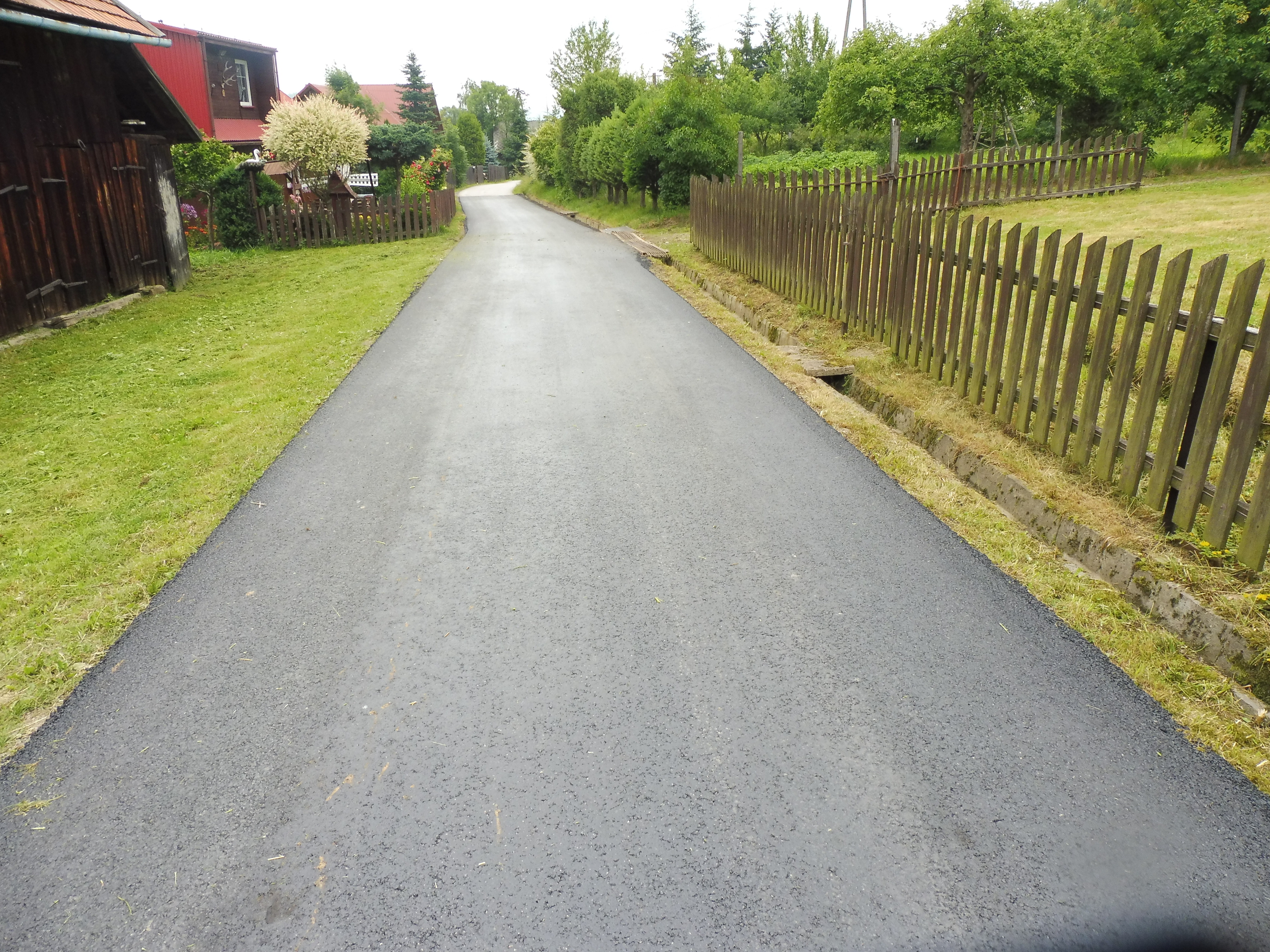 Obraz przedstawiający Remont i wykonanie nawierzchni asfaltobetonowych na terenie Gminy Stryszawa